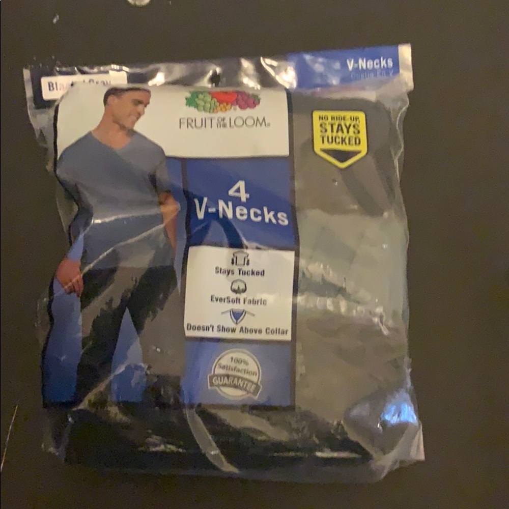 Never opened! 4 v neck shirts